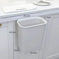Donha wall-mounted kitchen trash can in white plastic, 4L capacity, hanging design for kitchen or living room storage.