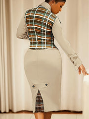 A Stylish Two-Piece Work Outfit Featuring a Checkered Vest And a Fitted Dress, Perfect for Professional Settings.