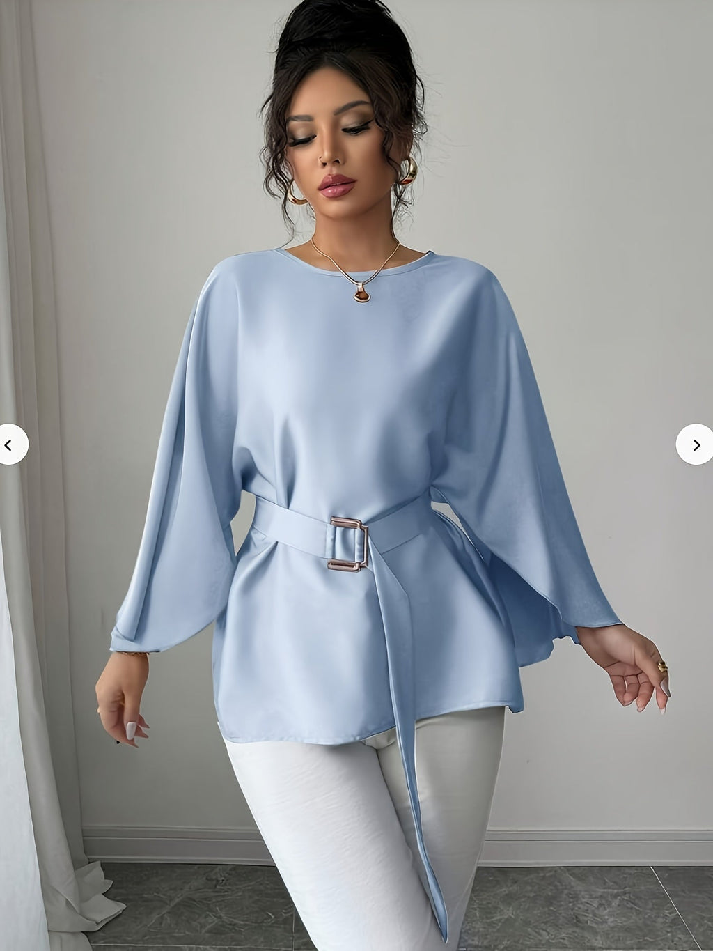 Light blue long sleeve belted blouse with elegant crew neck by SHOWLU FASHION, perfect for stylish office or casual wear.