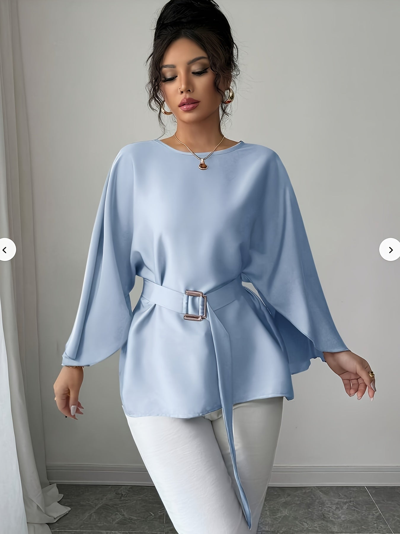 Light blue long sleeve belted blouse with elegant crew neck by SHOWLU FASHION, perfect for stylish office or casual wear.