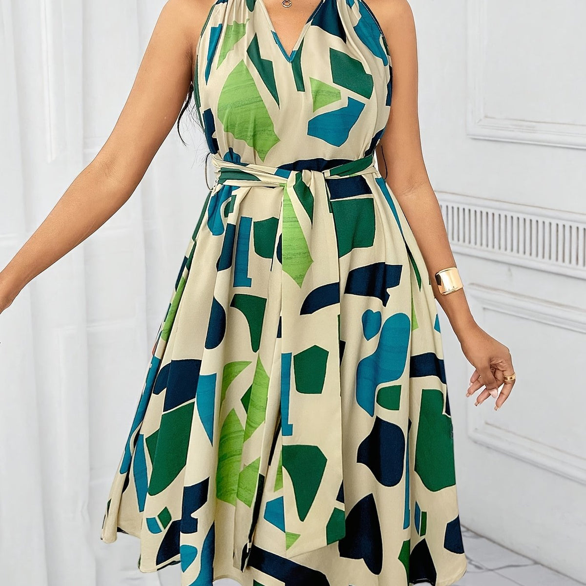 Women's geometric print V-neck A-line dress with bow waist tie by SHOWLU FASHION STORE, showcasing a stylish, feminine silhouette.