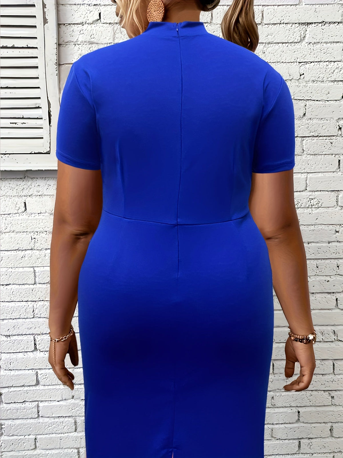 Plus size black midi dress with pockets by SHOWLU FASHION STORE, featuring a stylish, comfortable design for women.