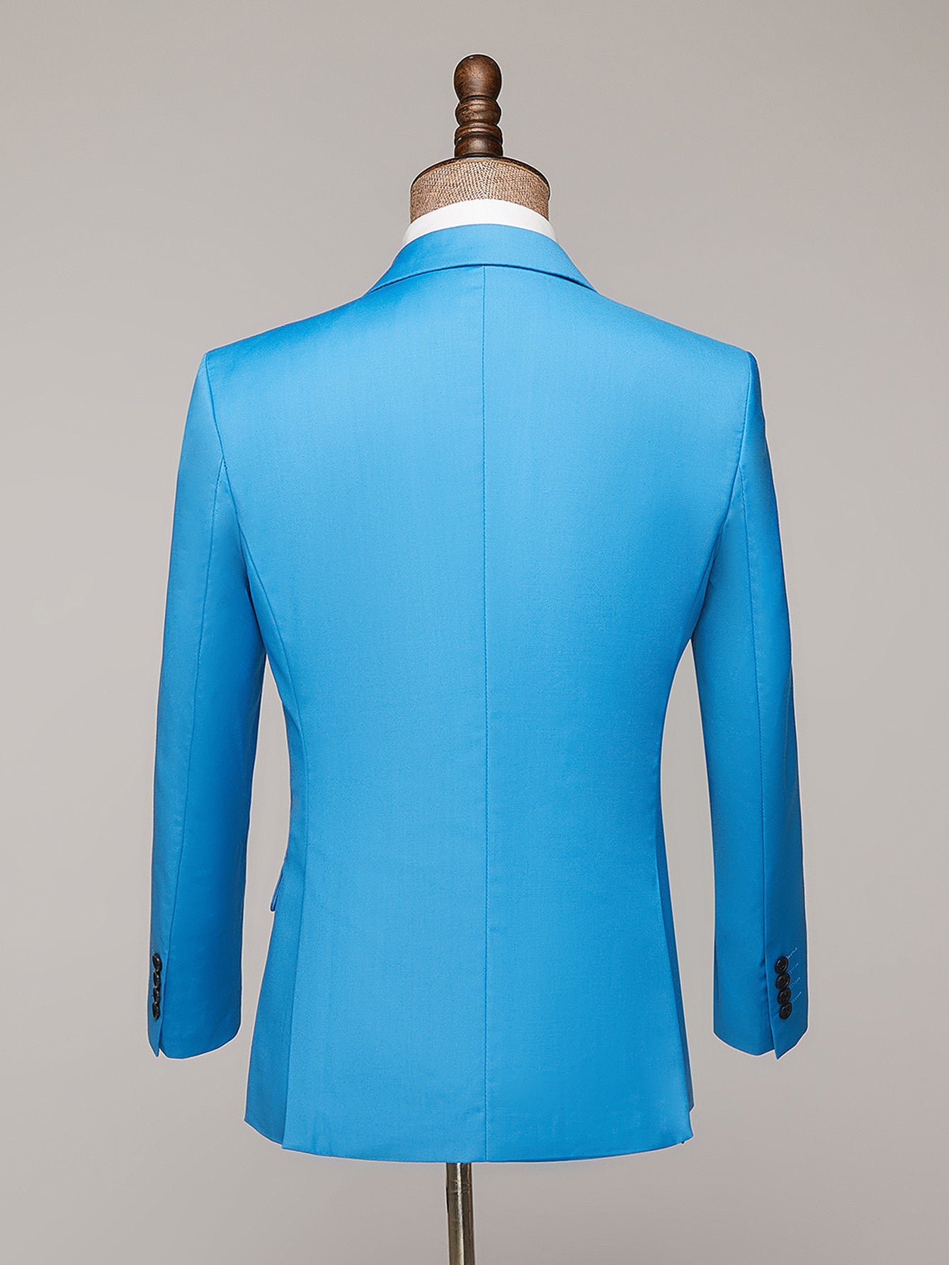 SHOWLU Men's double-breasted slim fit suit with solid polyester fabric, featuring a tailored blazer and matching trousers.