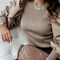 SHOWLU Women's black ribbed blouse with puff sleeves and crew neck, elegant and stylish top for women.