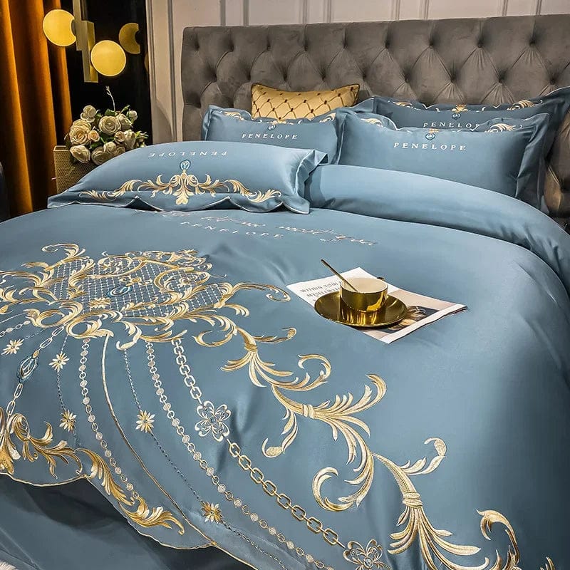 Egyptian cotton bedding set with golden embroidery, includes duvet cover and sheets, super-soft and luxurious for king and queen sizes.