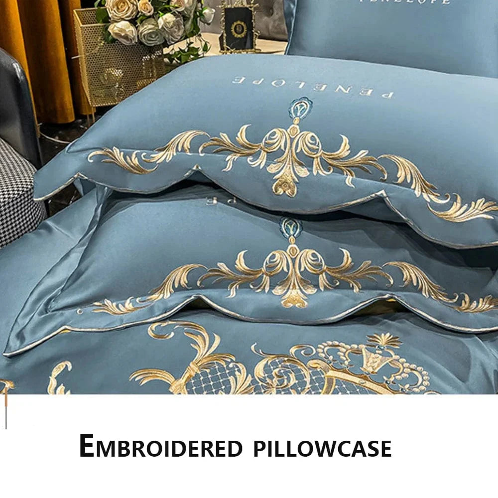 Egyptian cotton bedding set with golden embroidery, duvet cover, and matching sheets in king and queen sizes, super-soft and stylish.