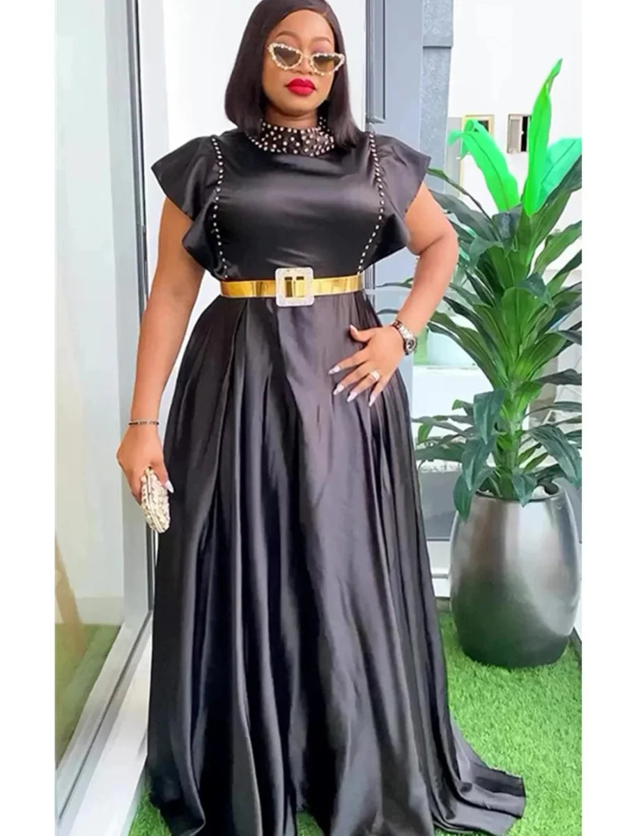 Elegant African sleeveless wedding party long dress in plus size, featuring vibrant fabric, perfect for summer events and evening occasions.