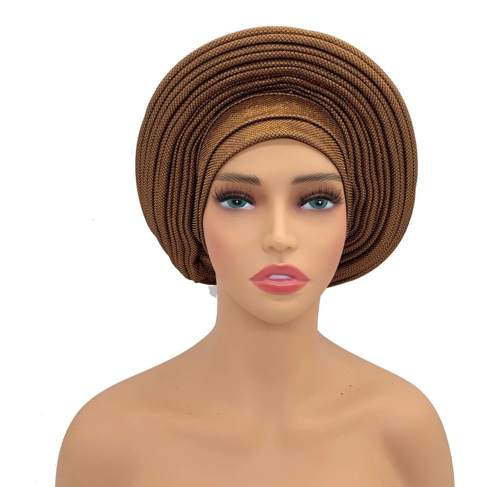 Elegant African auto gele headtie from Showlu Fashion Store, stylish women's turban head wrap for weddings and parties.