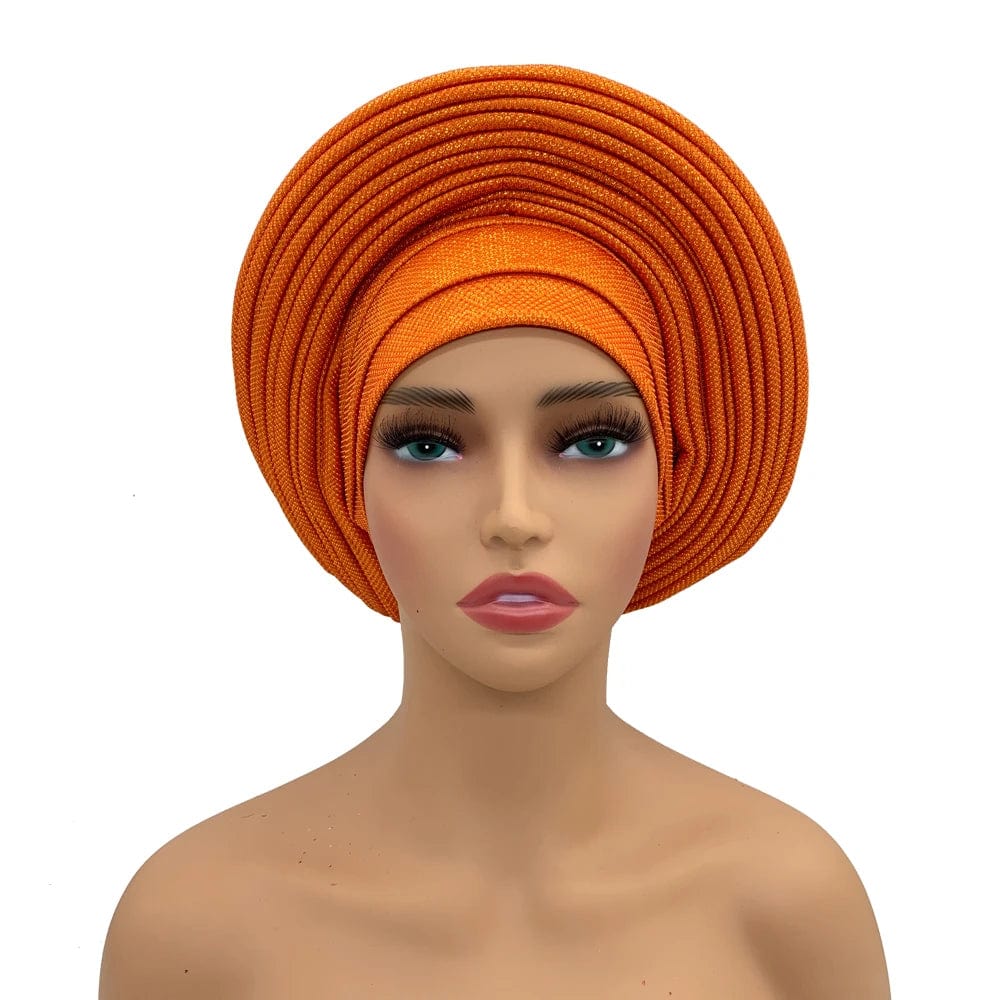 Elegant African auto gele headtie by Showlu Fashion Store, stylish women's turban head wrap for weddings and parties.