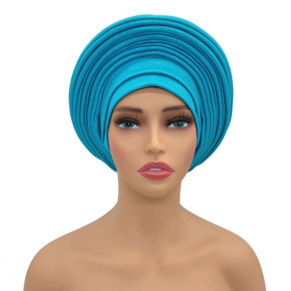Elegant African auto gele headtie by Showlu Fashion Store, stylish women's turban head wrap for weddings and parties.