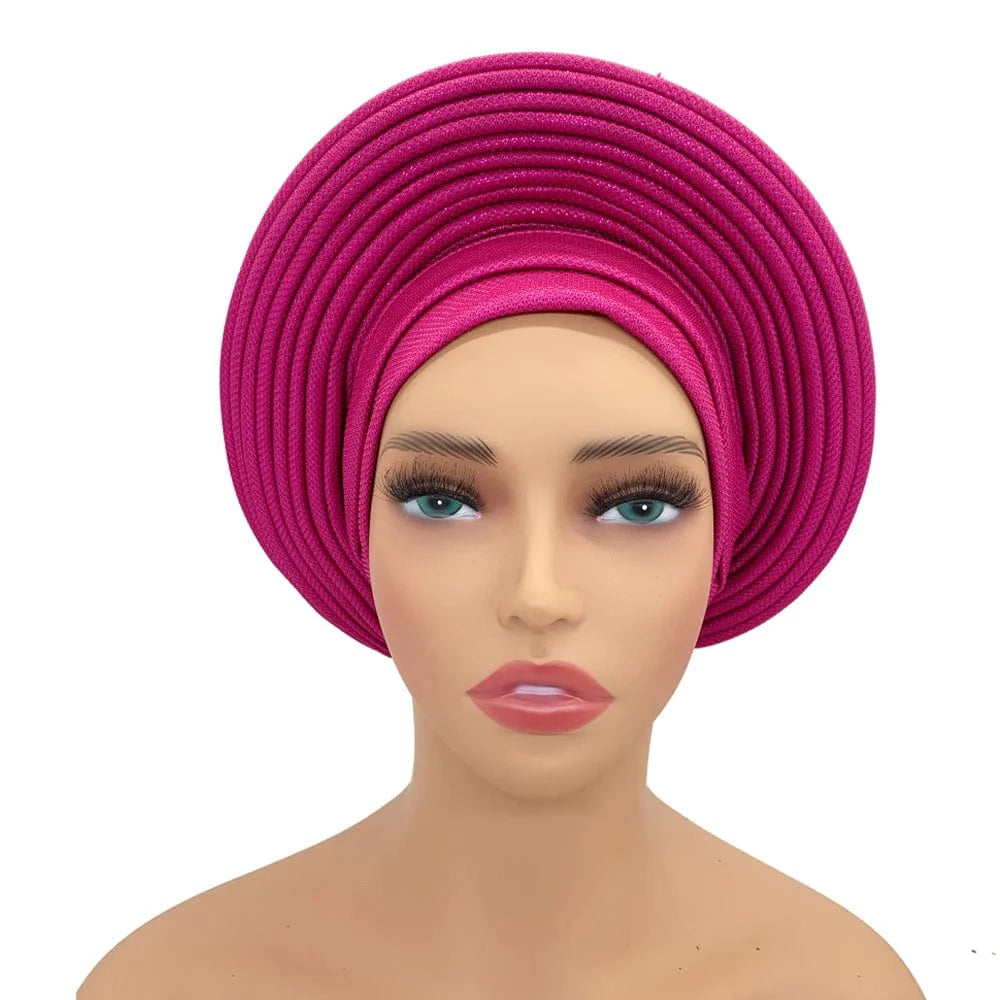 Elegant African auto gele headtie by Showlu Fashion Store, stylish women's turban wrap for weddings and parties.