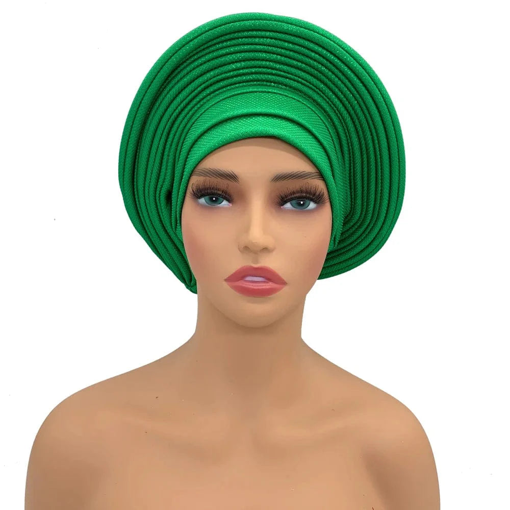 Elegant African auto gele headtie, women's turban head wrap with intricate designs, perfect for weddings and parties.