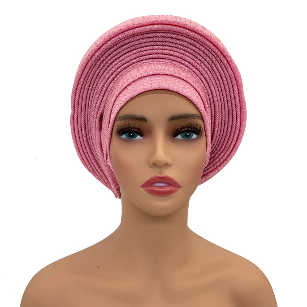 Elegant African auto gele headtie from Showlu Fashion Store, stylish women's turban head wrap for weddings and parties.