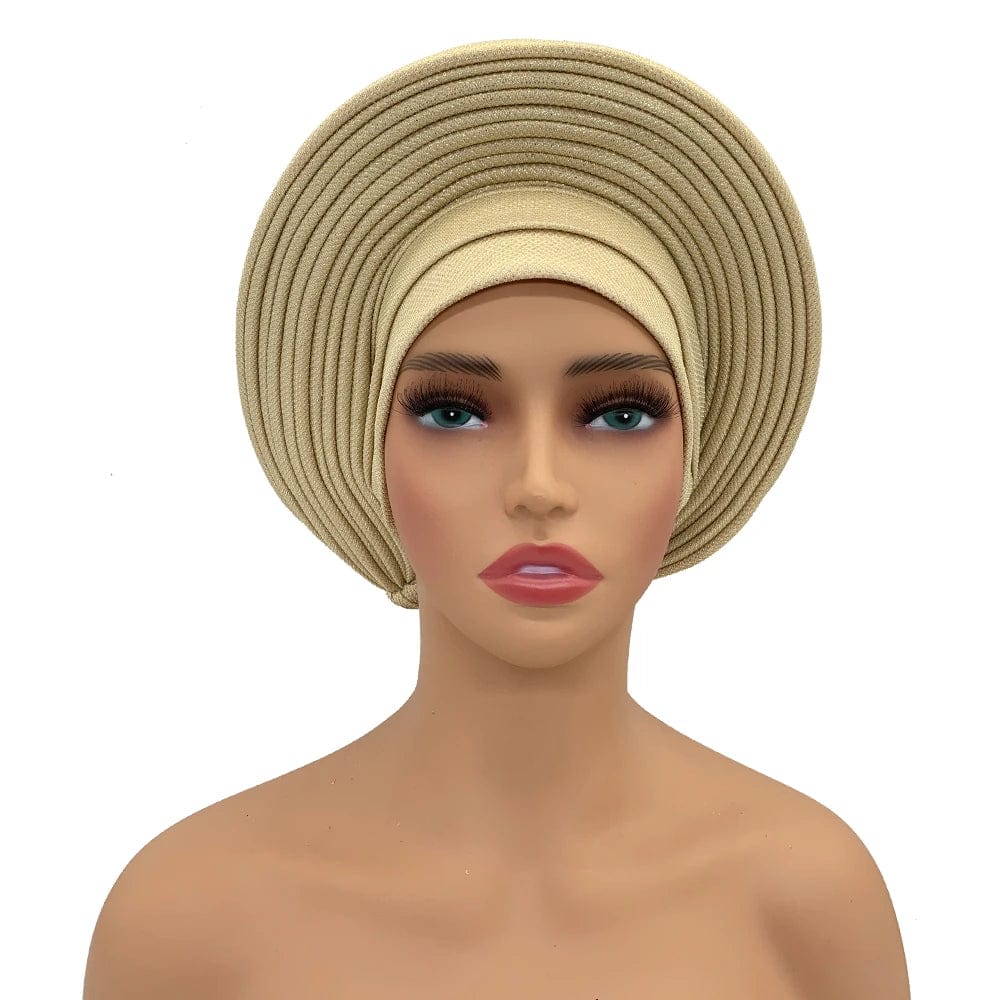 Elegant African auto gele headtie turban by Showlu Fashion Store, stylish women's head wrap for weddings and parties.