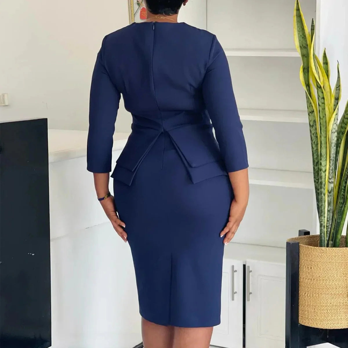 A stylish AOMEI Women's Peplum Church Dress with 3/4 sleeves, modest sheath design, suitable for church or office wear.