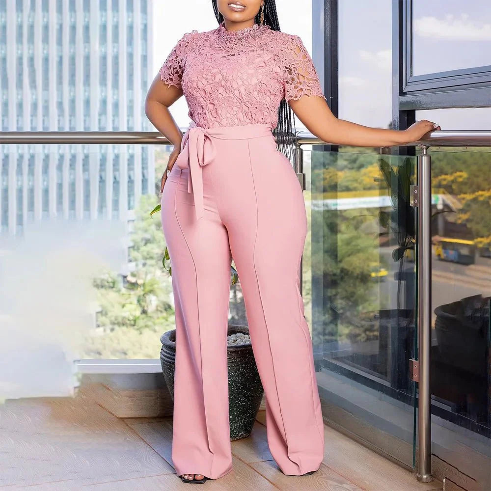 Elegant SHOWLU Women's Lace Patchwork Jumpsuit with high waist, short sleeves, and sash, ideal for parties and special occasions.