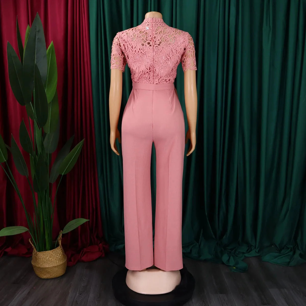 Elegant SHOWLU Women's lace patchwork jumpsuit with high waist, short sleeves, and sash, perfect for parties and special occasions.