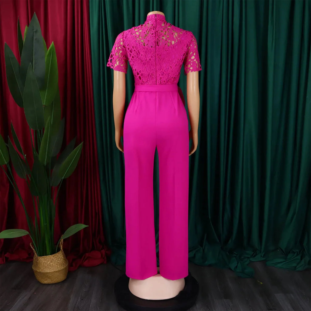 Elegant SHOWLU Women's lace patchwork jumpsuit with O-neck, short sleeves, and sash, perfect for party or special occasions.
