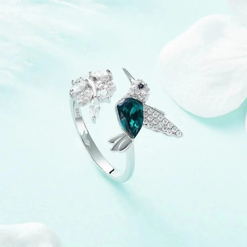 Elegant blue stone hummingbird ring for women, adjustable zinc alloy cocktail jewelry with glass-filled design for special occasions.