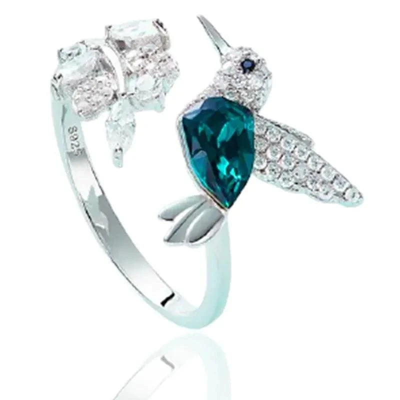 Elegant blue stone hummingbird ring for women, adjustable zinc alloy cocktail jewelry, perfect for engagement or parties.