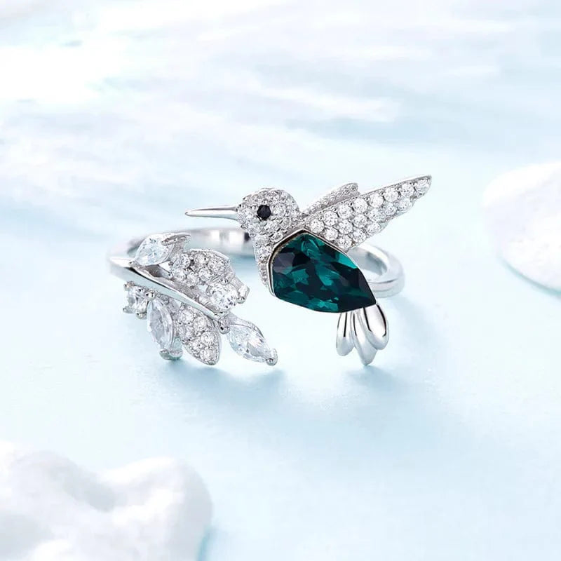 Elegant blue stone hummingbird ring for women, adjustable zinc alloy cocktail jewelry, perfect for engagement or wedding parties.