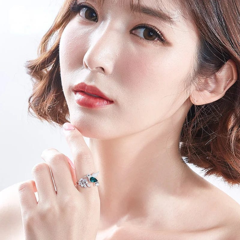 Elegant blue stone hummingbird ring for women, adjustable zinc alloy cocktail jewelry with natural blue glass filling.