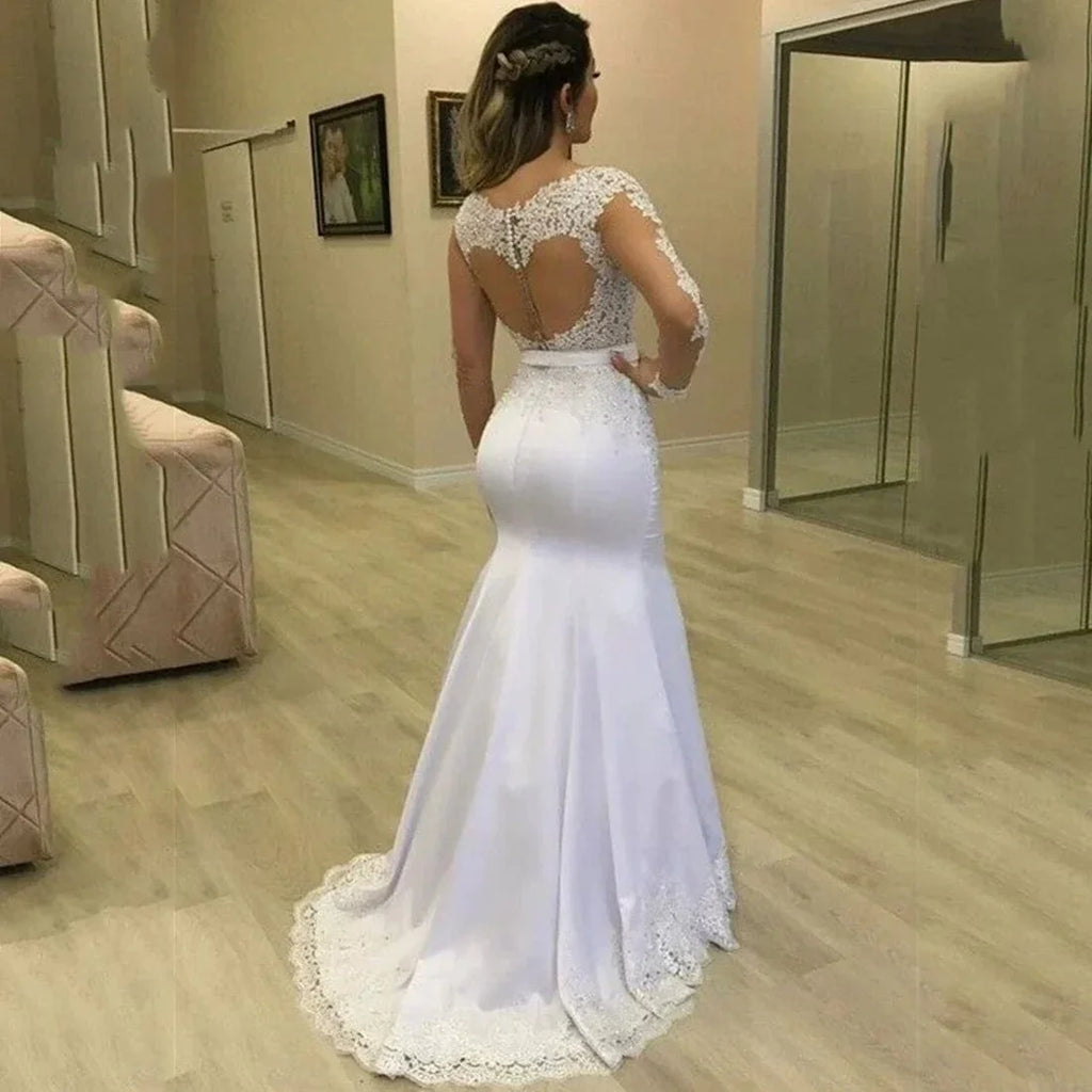 Elegant Noble Weiss mermaid wedding dress with lace appliques, long sleeves, and o-neck design, tailored for a sophisticated bridal look.