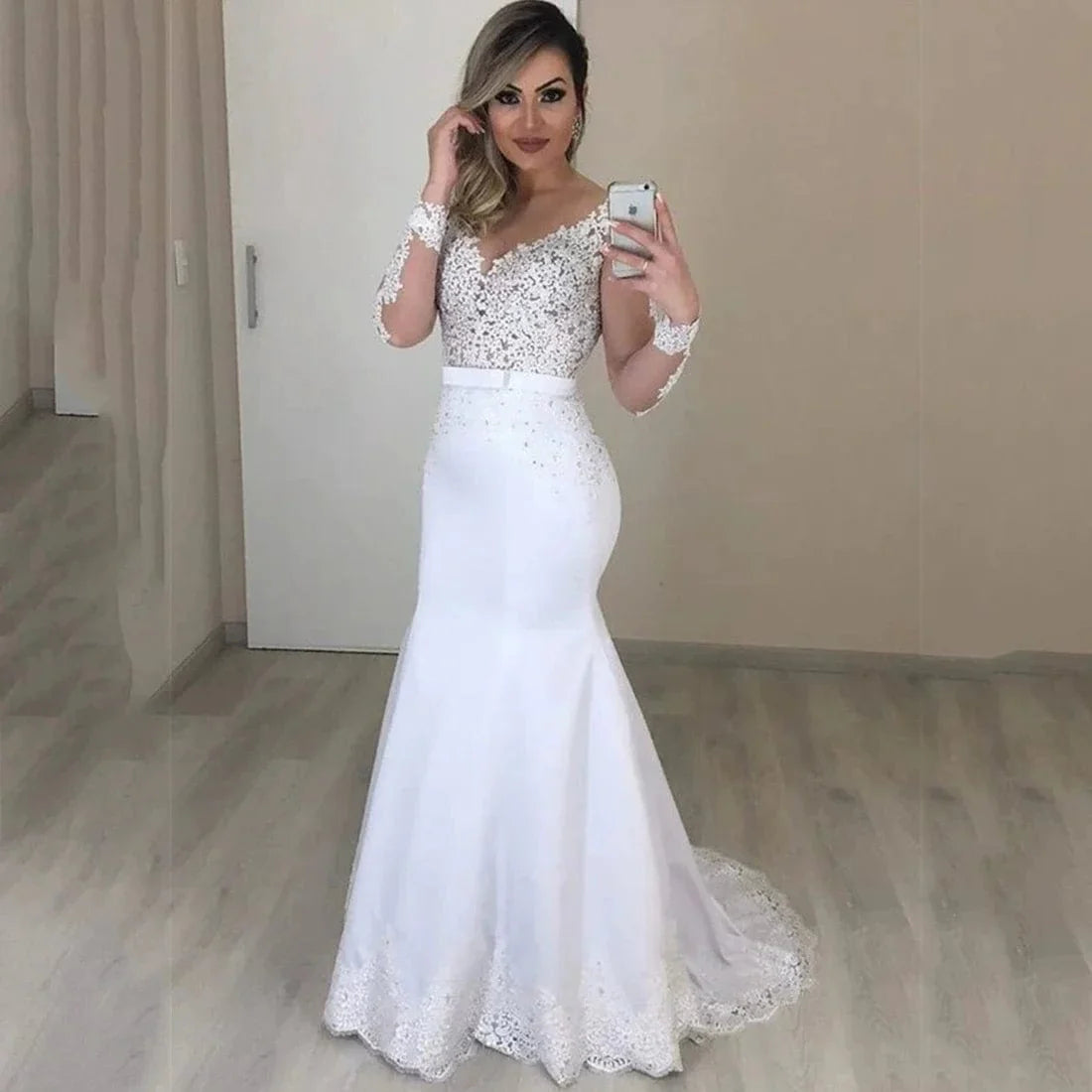 Elegant mermaid wedding dress by SHOWLU FASHION with lace appliques, long sleeves, and an O-neck design.