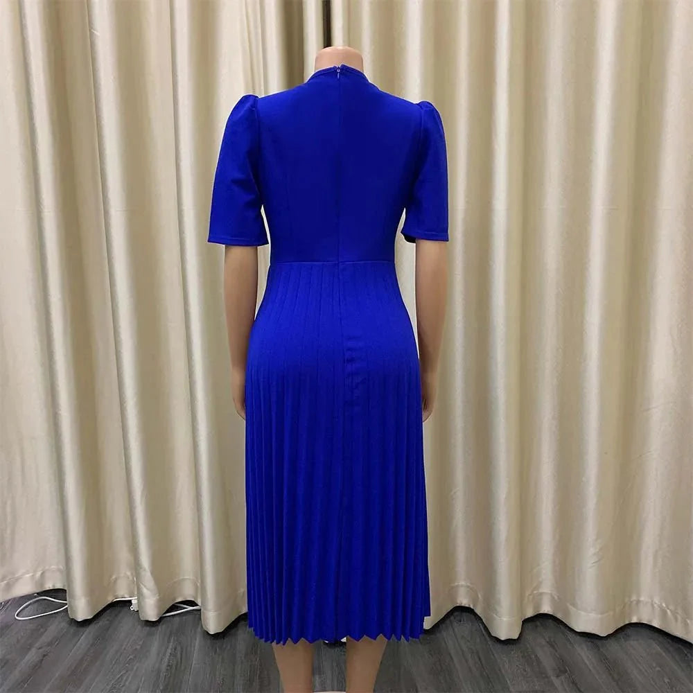 Showlu Fashion women's pleated office dress with short sleeves, midi length, O-neck, suitable for formal work and business wear.