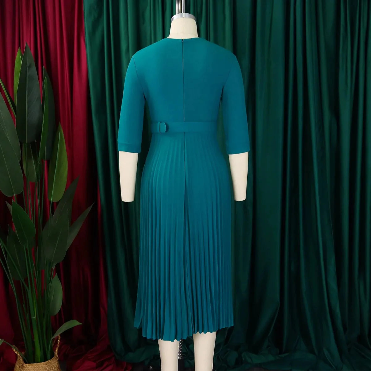Elegant women's notched collar midi dress by SHOWLU FASHION with half sleeves, belt, and a waist-emphasizing design for office or parties.