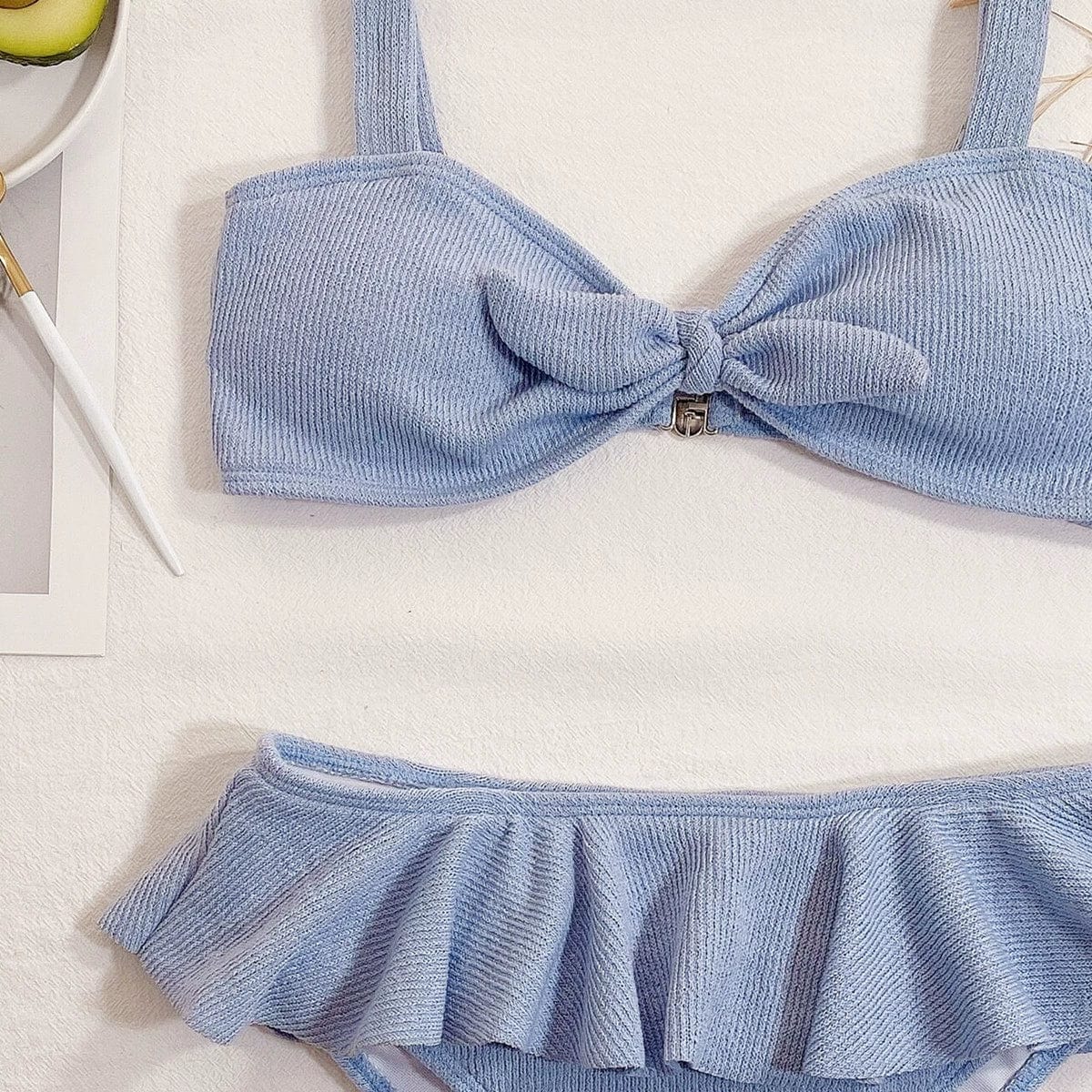 Elegant ruffled high-waist bikini by Showlu Fashion, two-piece sexy swimsuit featuring feminine ruffle details and a flattering fit.