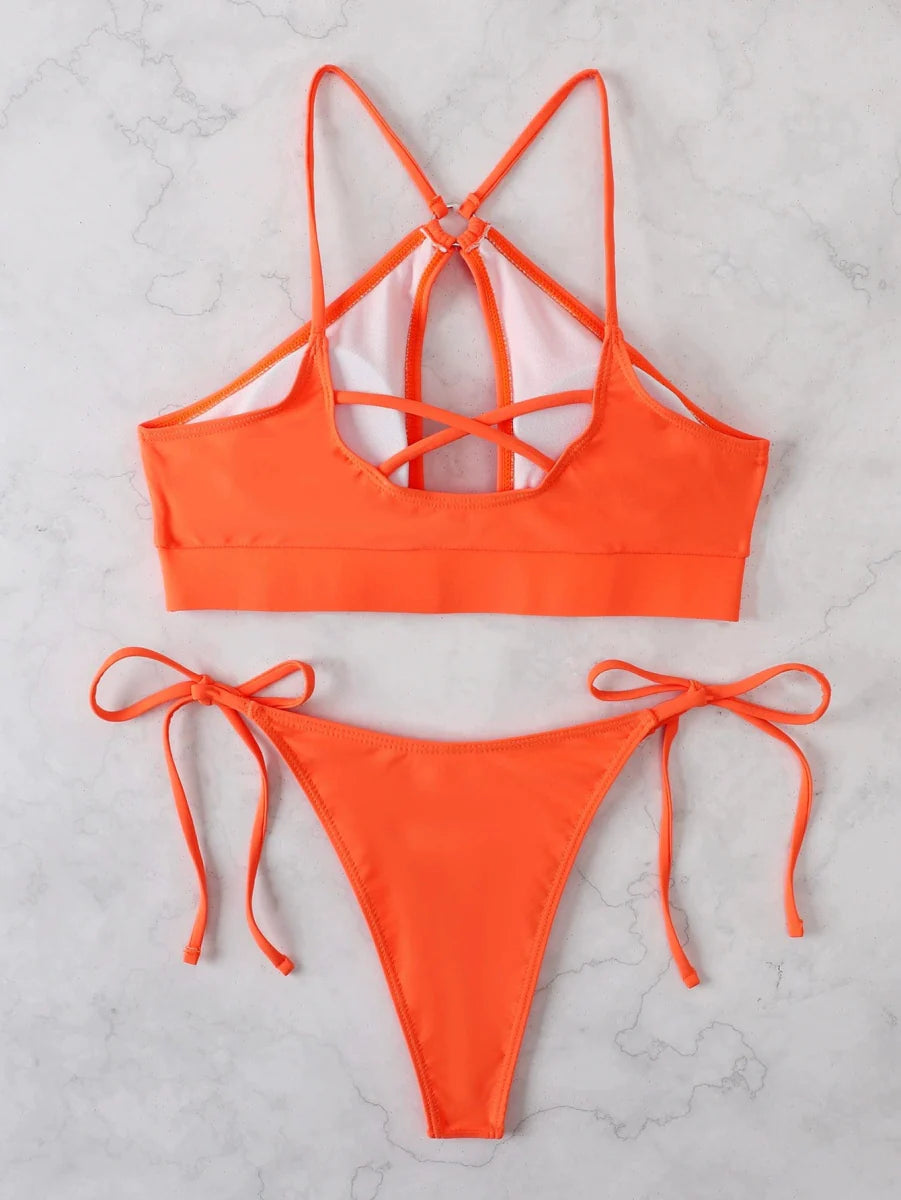 Elegant Showlu Fashion women's triangle bikini with solid color and stylish shoelace design, perfect for beachwear.