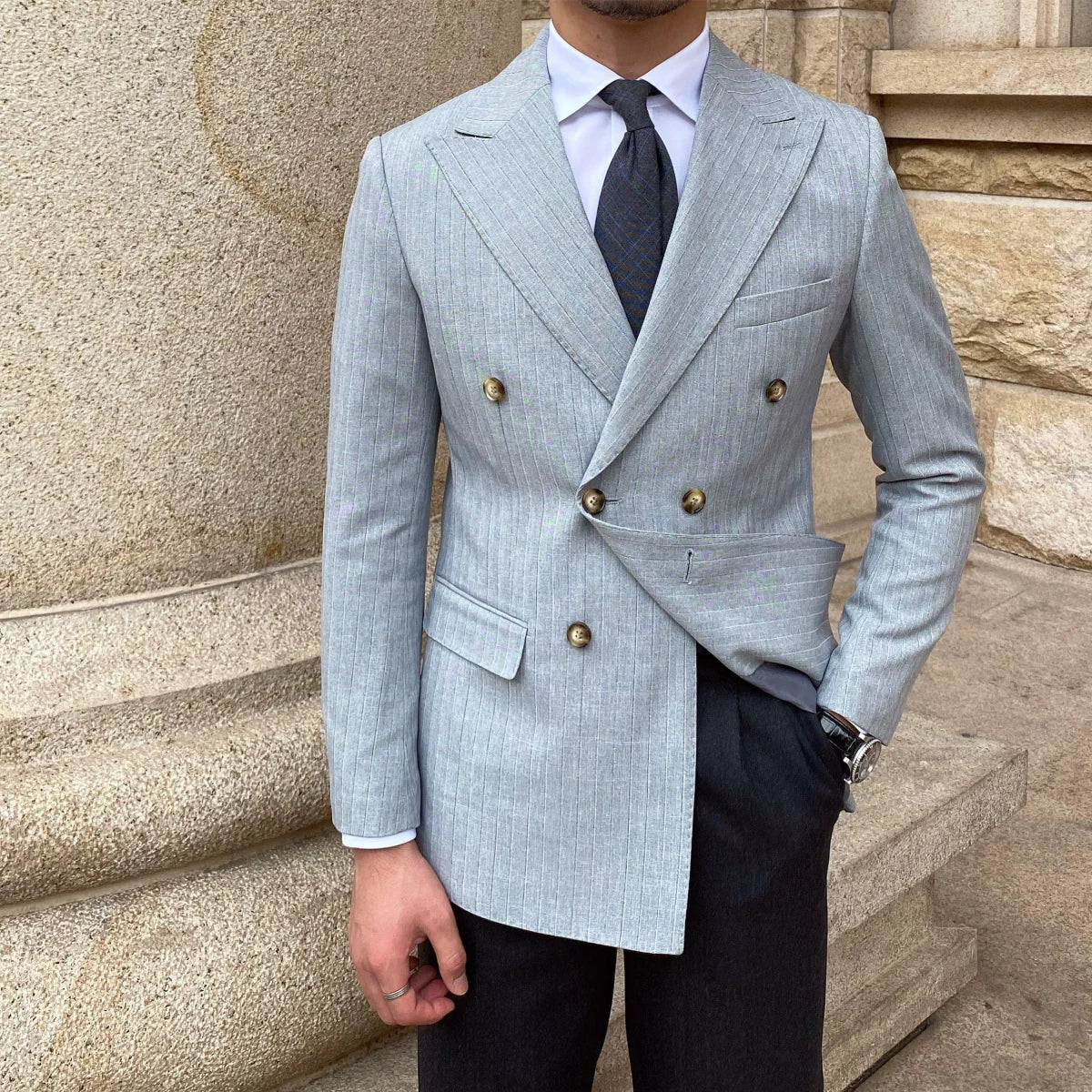 Men's slim fit double-breasted striped business suit by Showlu Fashion, featuring a tailored design and classic pattern.