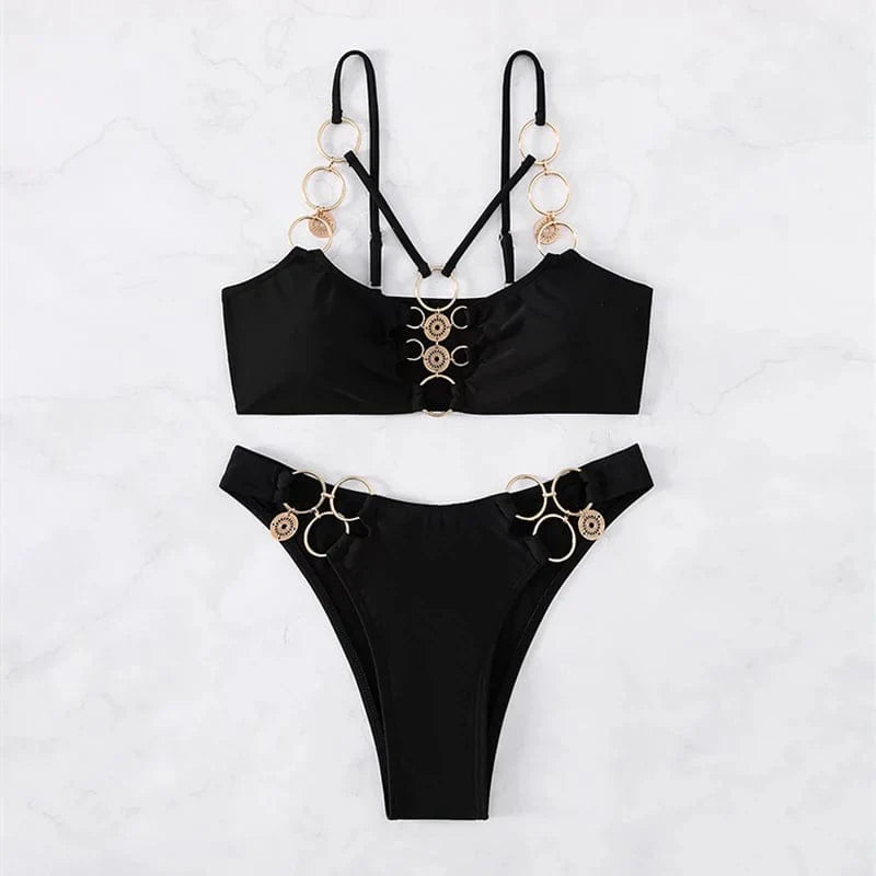 Elegant two-piece hollow metal ring bikini swimsuit for women by Showlu Fashion, featuring stylish design and modern swimwear details.