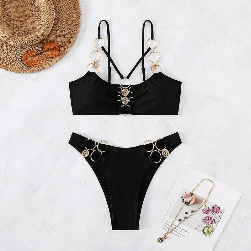 Elegant two-piece hollow metal ring bikini swimsuit for women by Showlu Fashion, featuring stylish design and metallic accents.