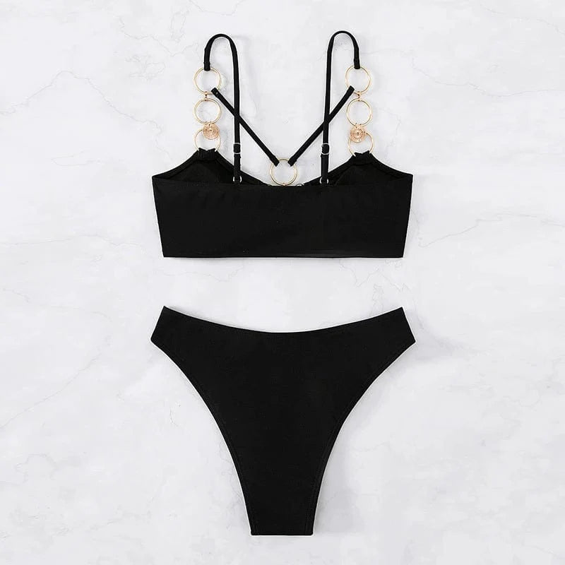 Elegant two-piece hollow metal ring bikini swimsuit for women by Showlu Fashion, featuring stylish metallic accents and a modern design.