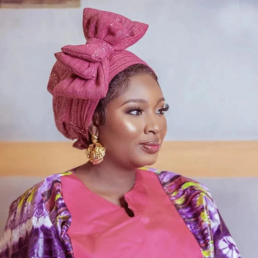 Elegant women's gold turban cap with multi-layer bowknot, African headtie, and stylish headwrap by Showlu Fashion.