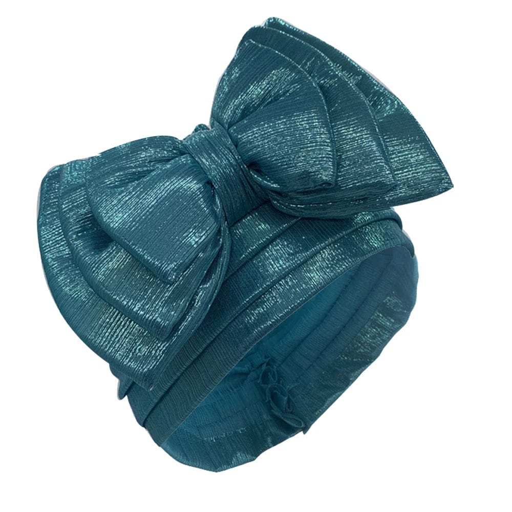 Elegant women's gold turban cap with multi-layer bowknot, African headtie, and headwrap style for stylish women.