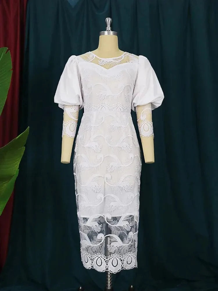 Elegant white lace embroidery pencil dress with puff sleeves, midi length, form-fitting sheath style, ideal for special occasions.