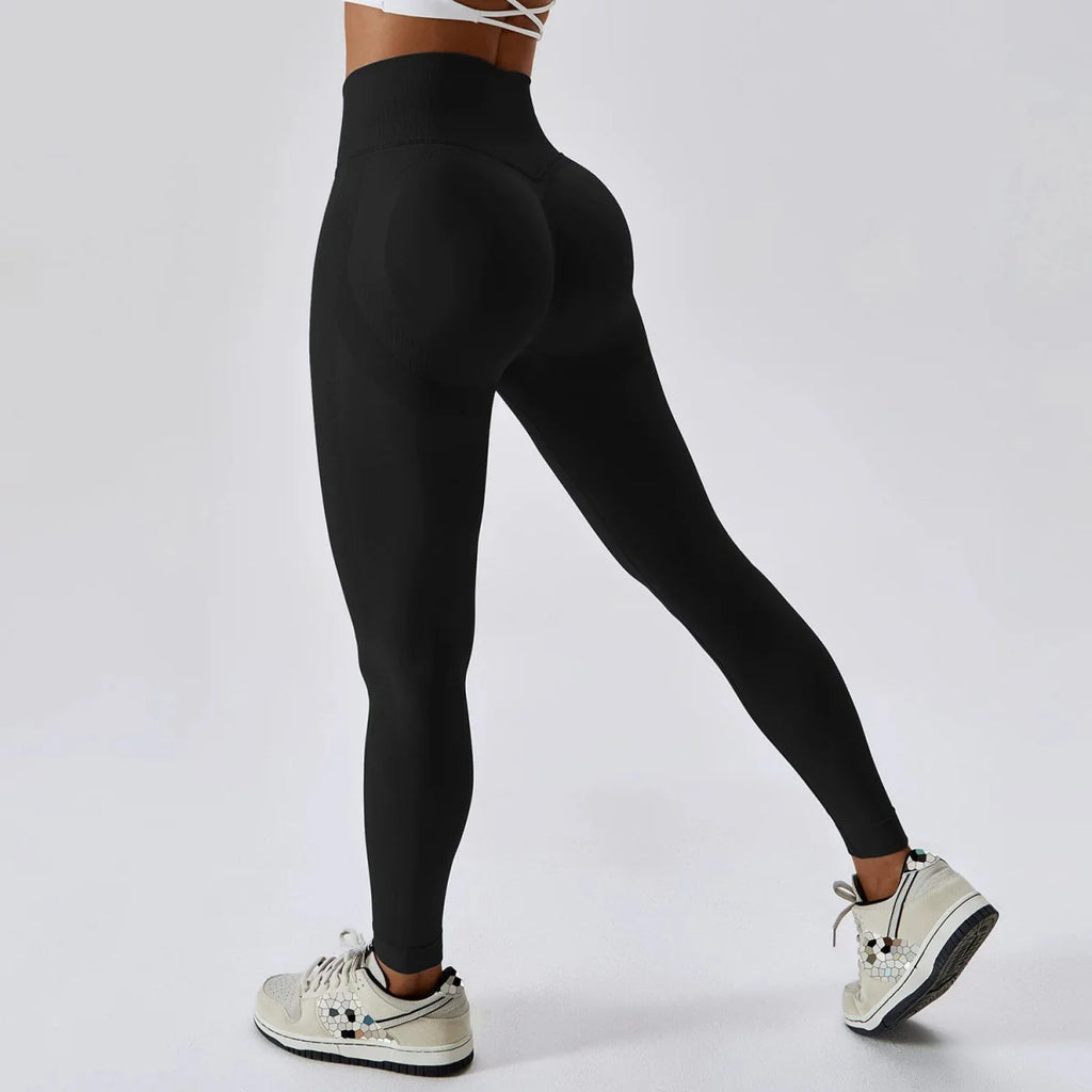 Showlu High Waist Seamless Yoga Pants with butt lifting design, black nylon fitness leggings for running, cycling, and workouts.