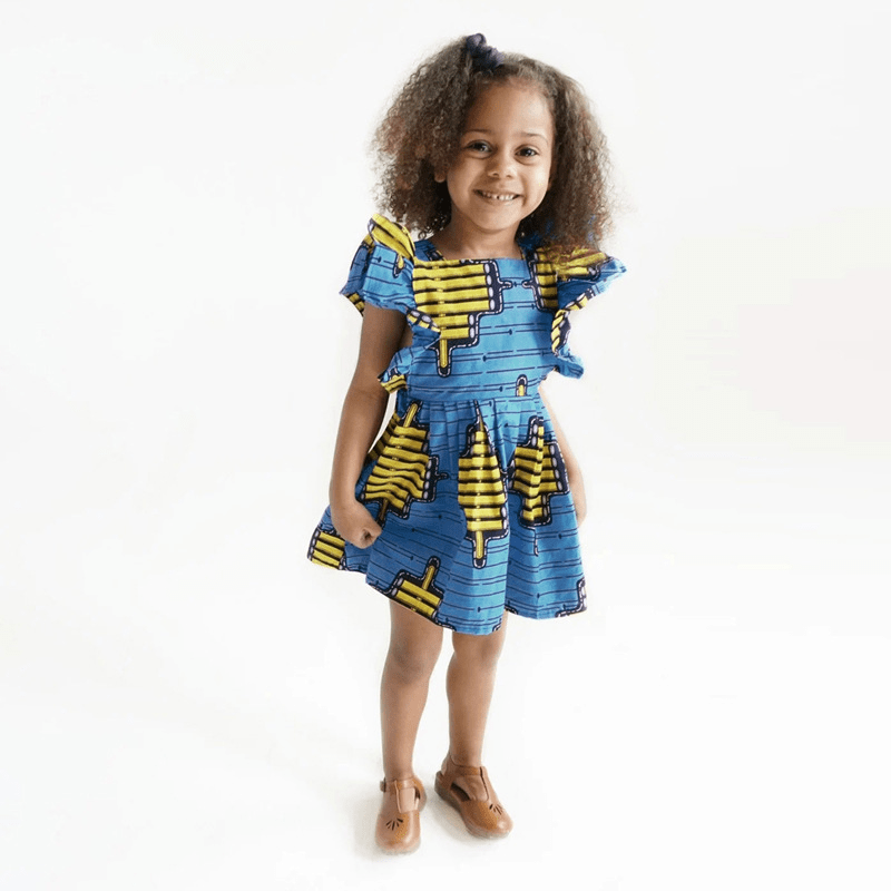 Girls wearing Showlu Fashion European-style summer dress with flying sleeves, featuring a stylish and breezy design.