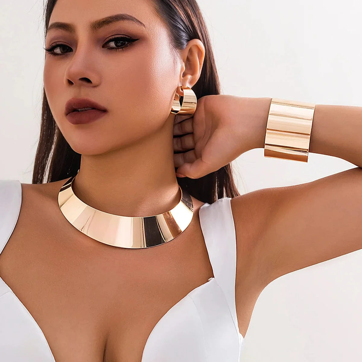 Showlu Fashion African collar jewelry set with wide smooth metal necklace and matching earrings for women, trendy African-inspired accessories.
