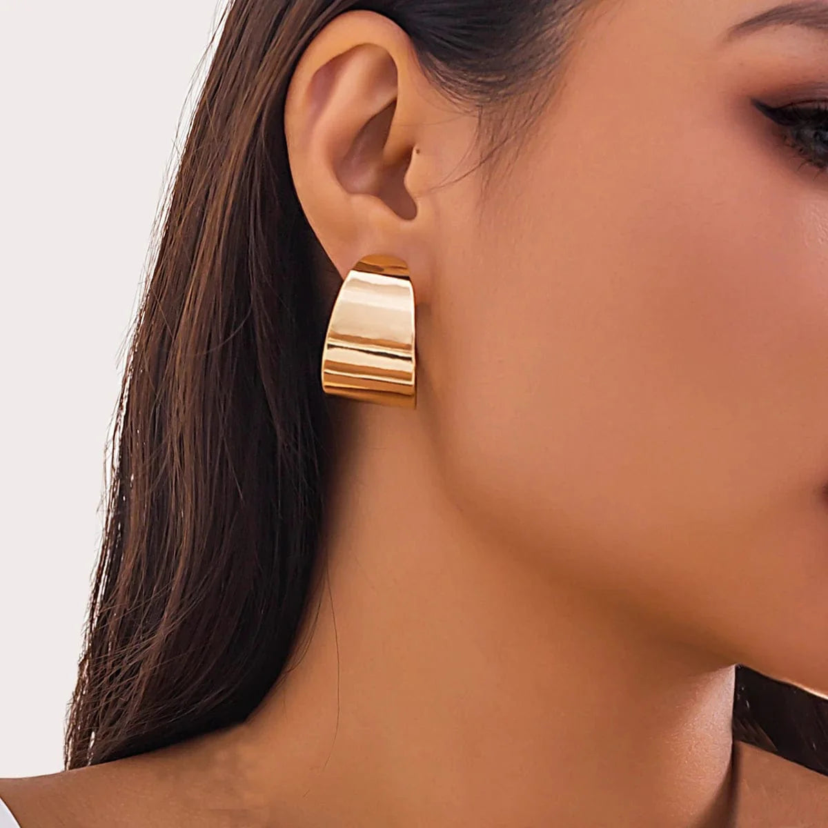 African collar jewelry set by Showlu Fashion with wide smooth metal necklace, matching earrings, and bracelet for women.