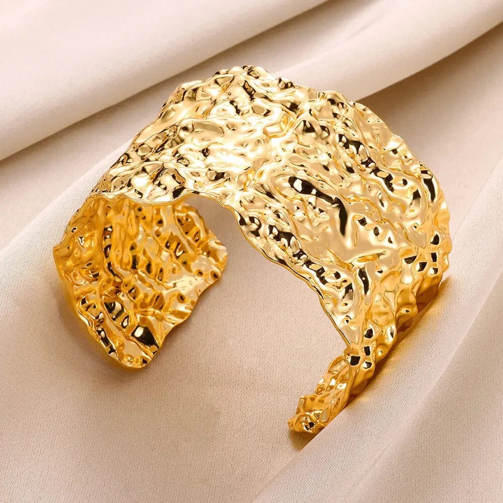 Gold stainless steel bump pattern cuff bracelet for women, stylish open bangle with classic design and hand ornament detail.