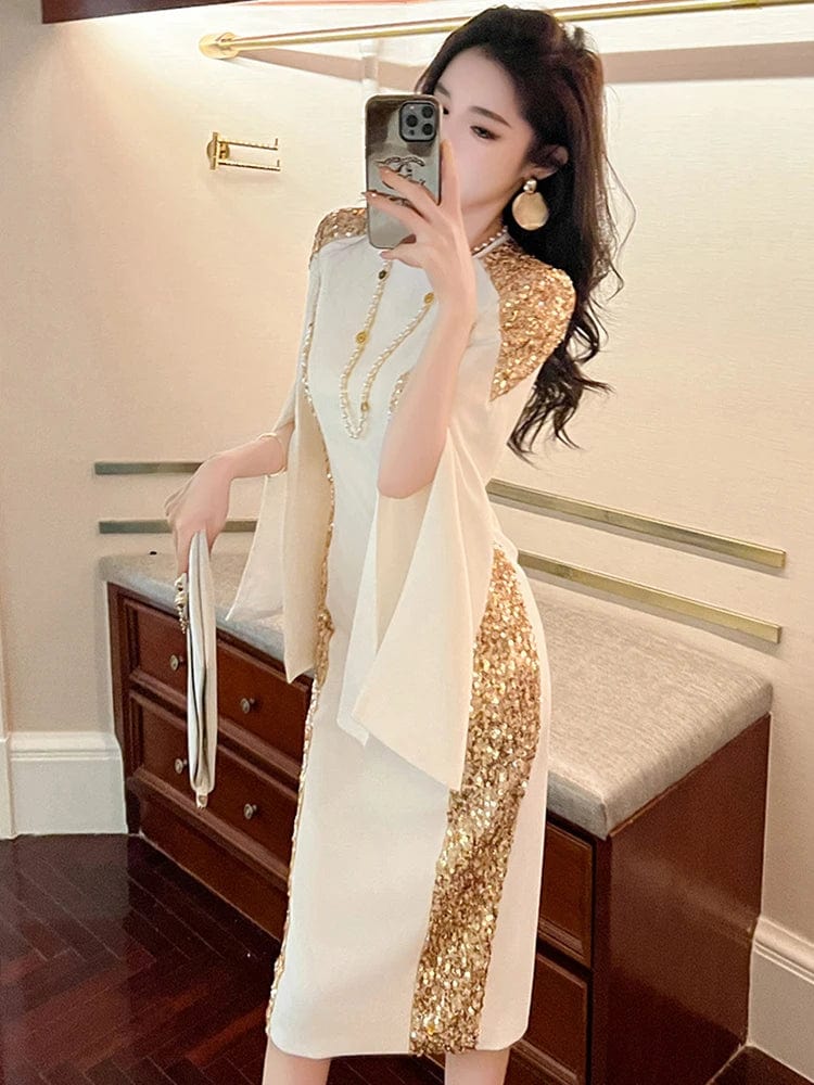 Gold sequin women's evening gown by Showlu Fashion, elegant slim party dress with luxurious design and white accents.