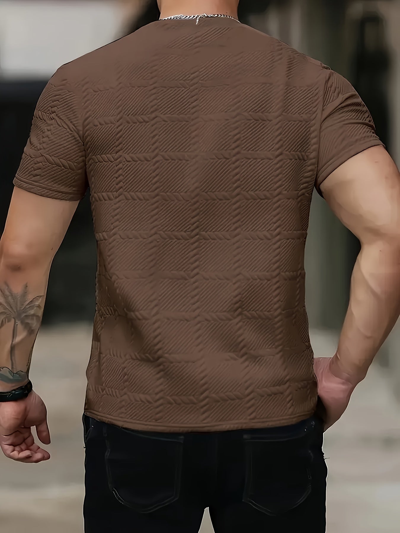 SHOWLU Men's geometric jacquard knit T-shirt with round neck, casual style, featuring intricate pattern and comfortable fit.