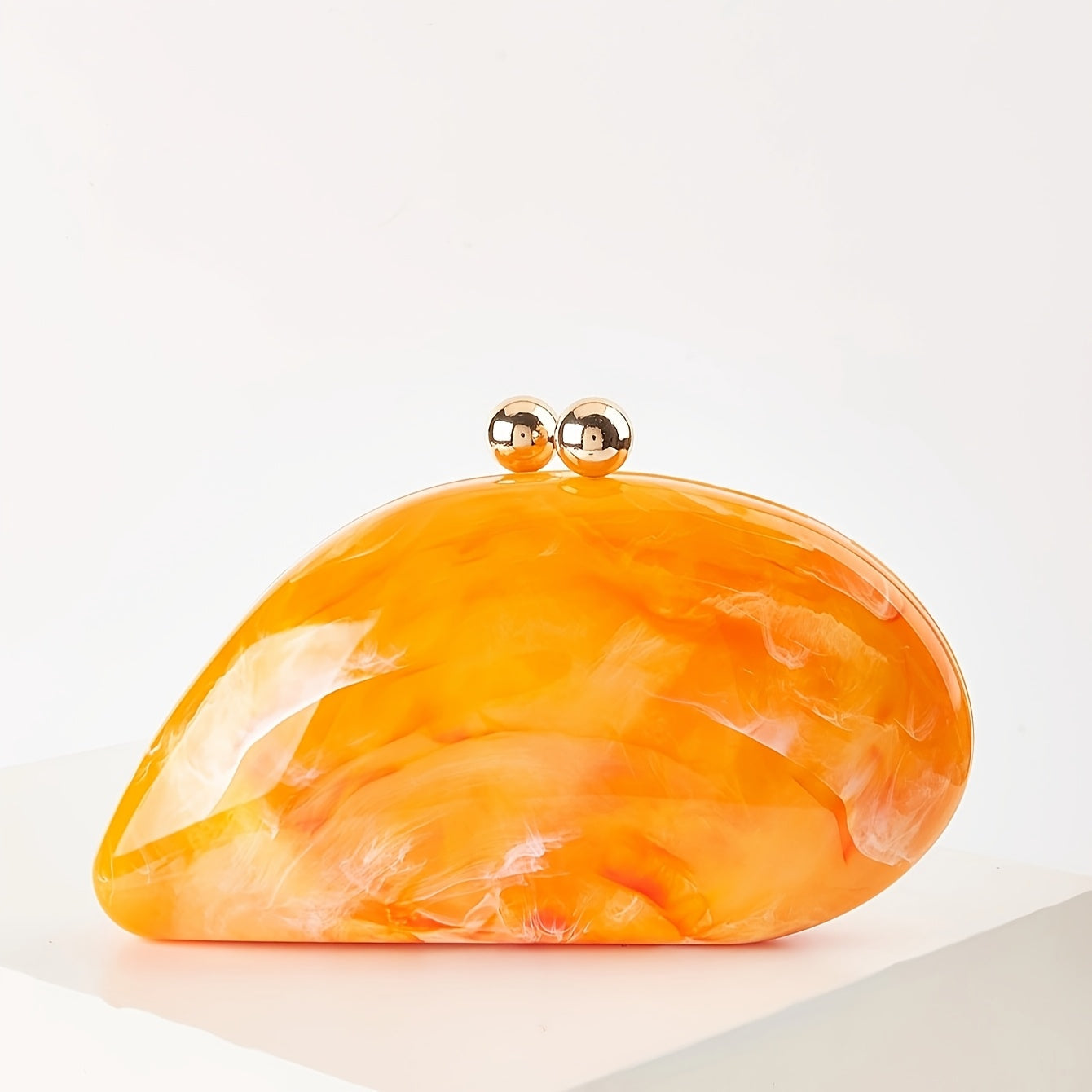 SHOWLU Marbled Acrylic Clutch with chain strap, elegant evening bag featuring a marbled design and sleek metal accents.