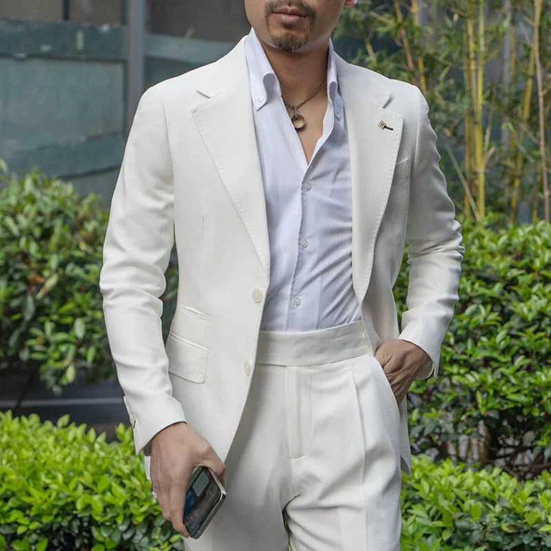 Showlu Fashion men's white two-piece slim fit suit set, featuring a tailored tuxedo style for formal or business occasions.