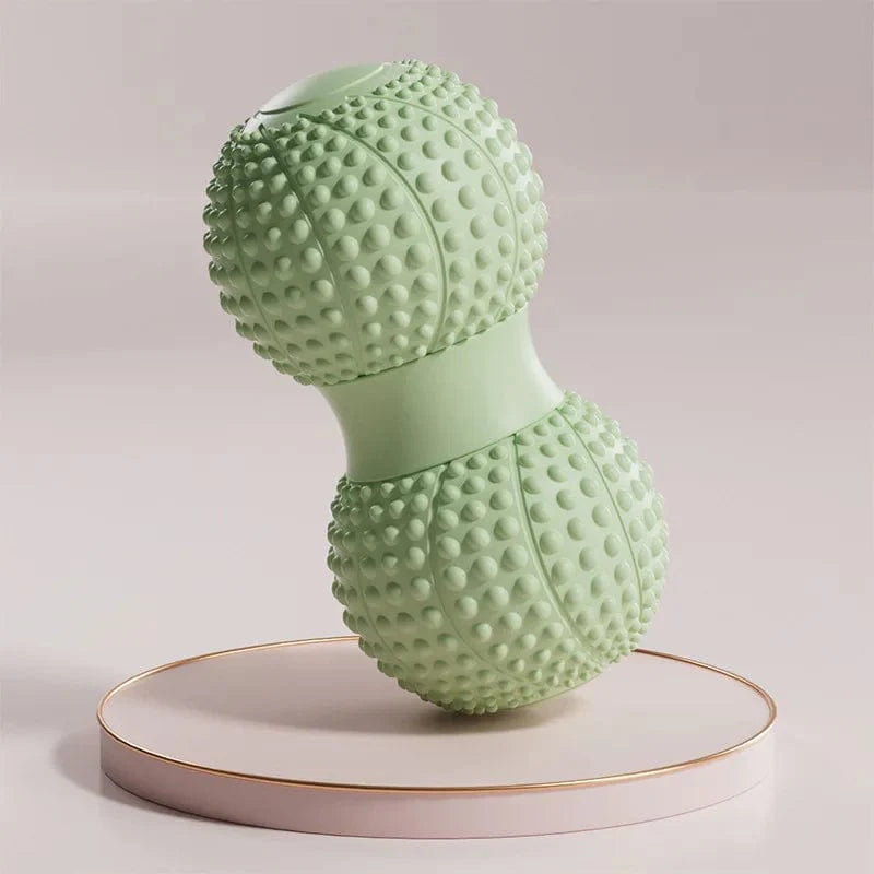 Peanut-shaped TPE muscle massage roller for back, neck, and foot relief, aiding fascia relaxation and muscle fatigue recovery.
