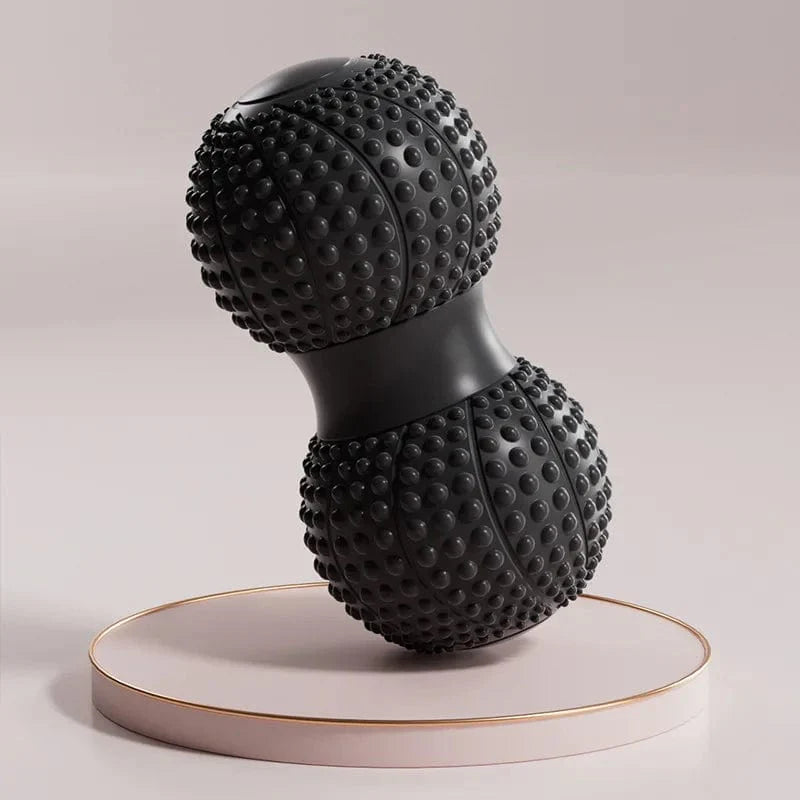 Peanut-shaped TPE muscle massage roller for back, neck, and foot relief, aiding fascia release and muscle relaxation.